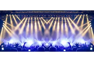 Live concert stage with lights and audience
